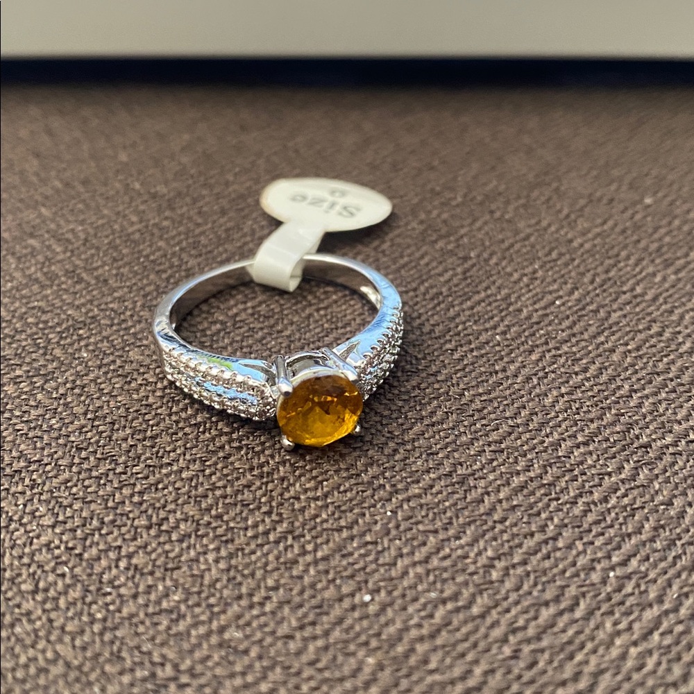 Elegant Silver plated Ring with Yellow Gemstone